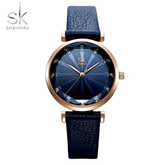 Black watch with rose gold accents on a white background, featuring the Shengke brand.