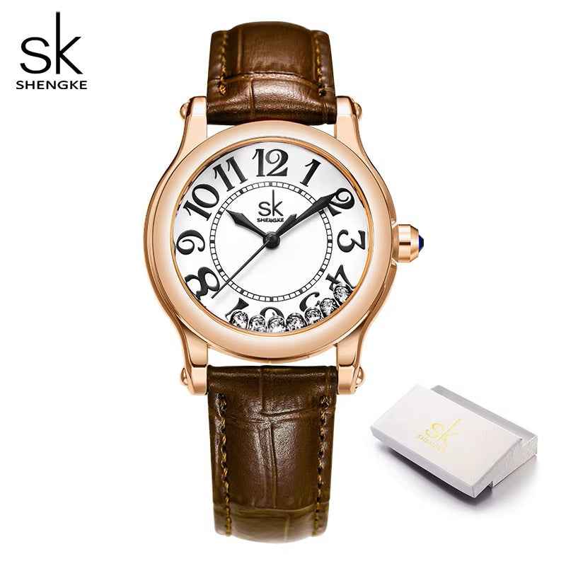 Watch with brown leather strap and rose gold case on white background, featuring Shengke brand.
