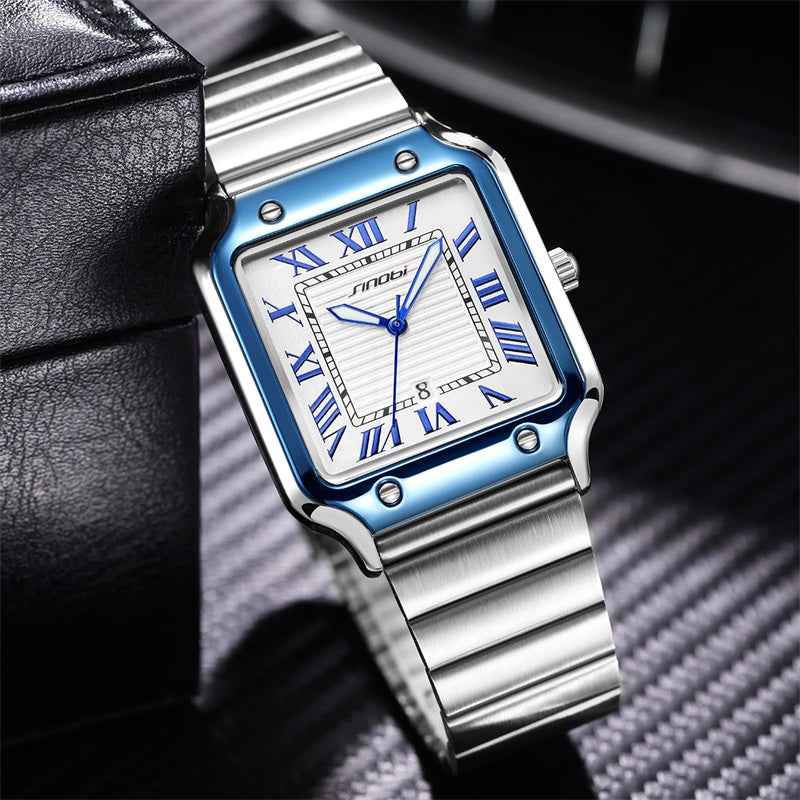Silver watch with blue accents on a dark textured background