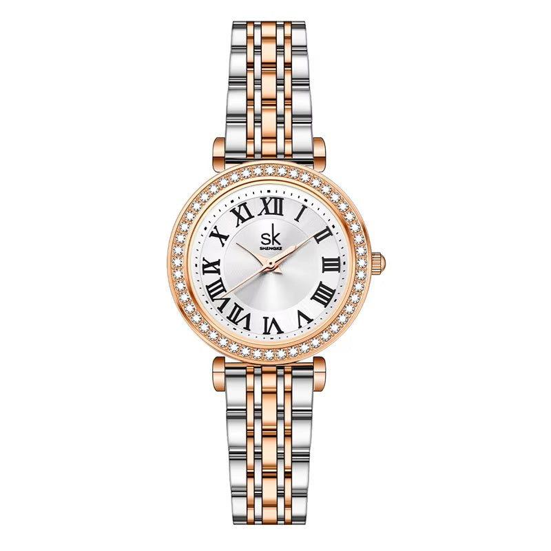 Two-tone watch with rose gold and silver band on a white background